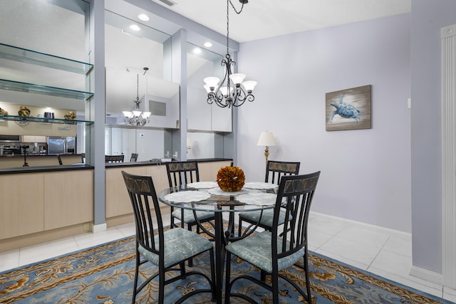 tiled dining area featuring a notable chandelier