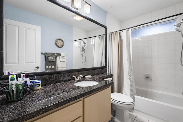 full bathroom featuring toilet, shower / tub combo, vanity, and tile patterned floors