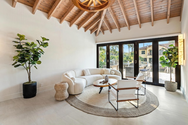 living room with beam ceiling, high vaulted ceiling, french doors, and wooden ceiling