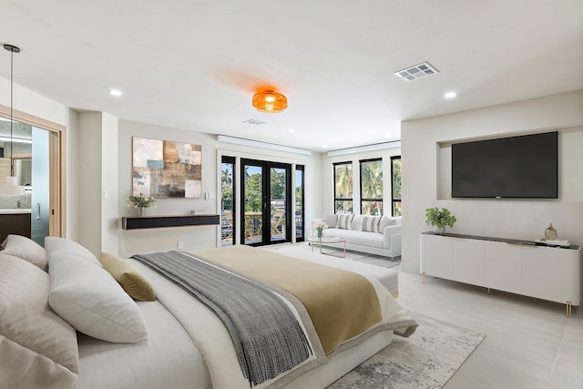 bedroom featuring access to exterior and french doors