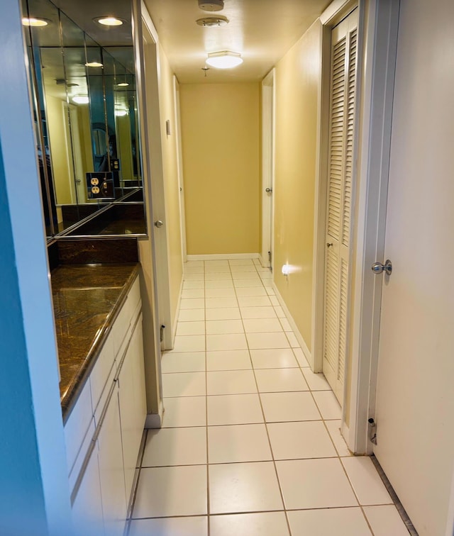 interior space with light tile patterned floors