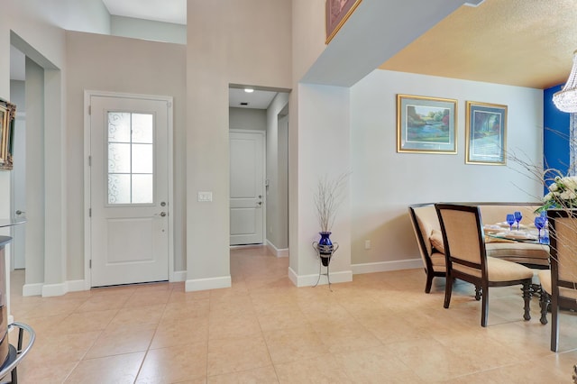 entrance foyer featuring light tile patterned floors