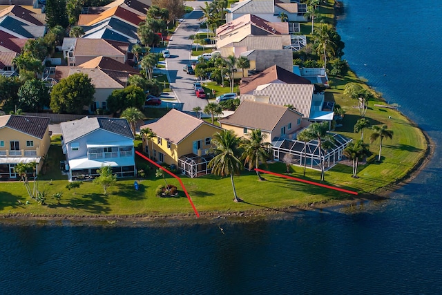 bird's eye view with a water view