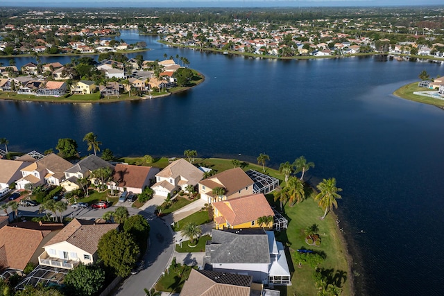 bird's eye view with a water view