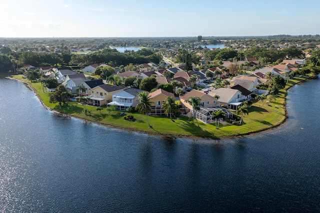 drone / aerial view with a water view