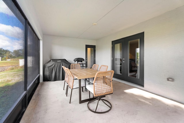 sunroom featuring french doors