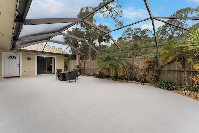 view of patio with a lanai