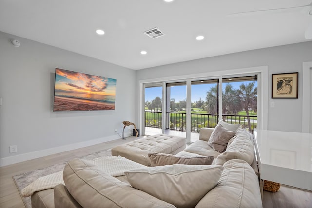 bedroom with light wood-type flooring and access to outside