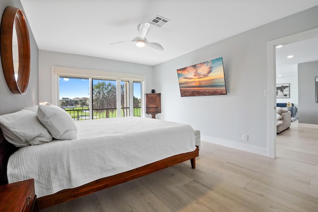 bedroom featuring access to exterior, ceiling fan, and light hardwood / wood-style floors