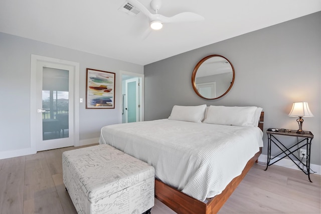 bedroom with ceiling fan and light hardwood / wood-style flooring