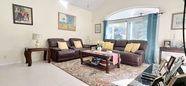 tiled living room with lofted ceiling