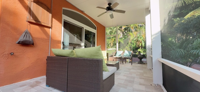 view of patio featuring outdoor lounge area and ceiling fan