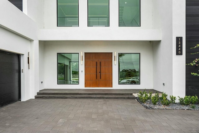 doorway to property featuring elevator