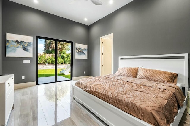 bedroom featuring ceiling fan and access to outside