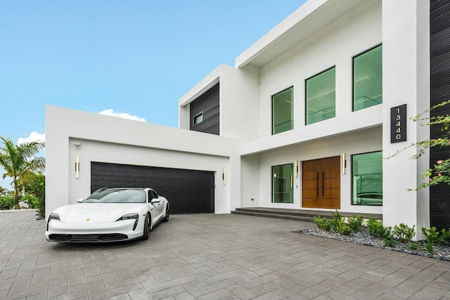 modern home featuring a garage