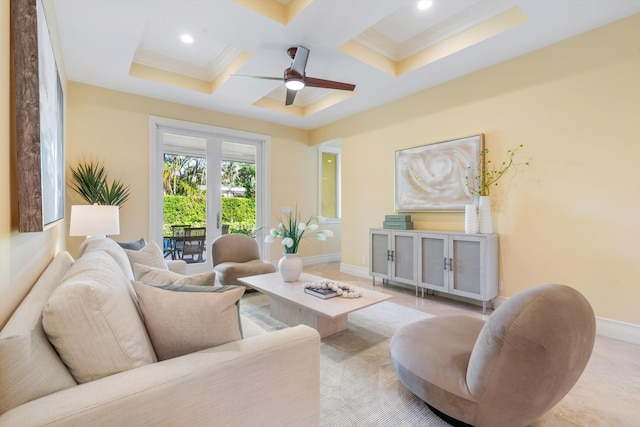 living room with beam ceiling, ceiling fan, and coffered ceiling