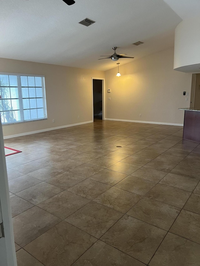 spare room featuring ceiling fan