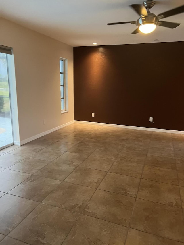 empty room featuring ceiling fan