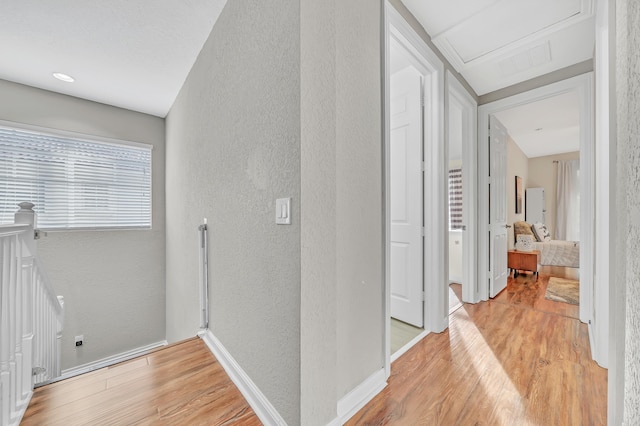 hallway featuring light hardwood / wood-style flooring