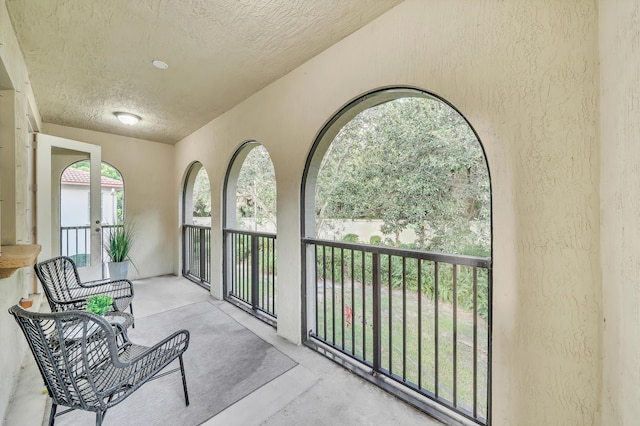 sunroom featuring french doors