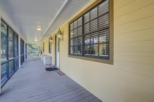 wooden deck featuring covered porch