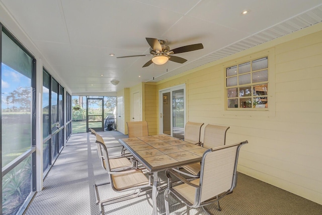 sunroom / solarium with ceiling fan