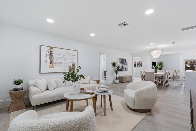 living room featuring light wood-type flooring