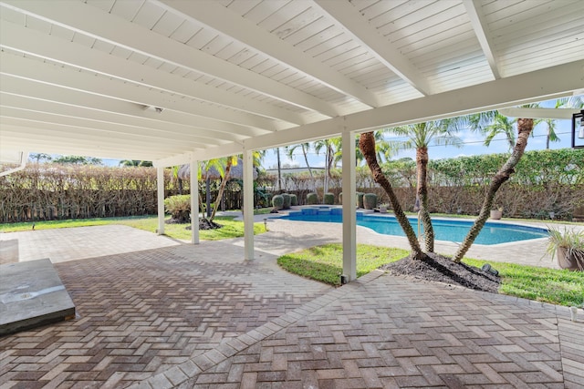 view of patio / terrace featuring a fenced in pool