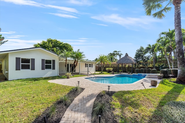 view of swimming pool with a gazebo, a yard, and a patio