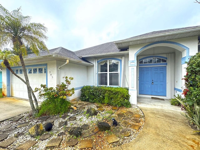 property entrance featuring a garage