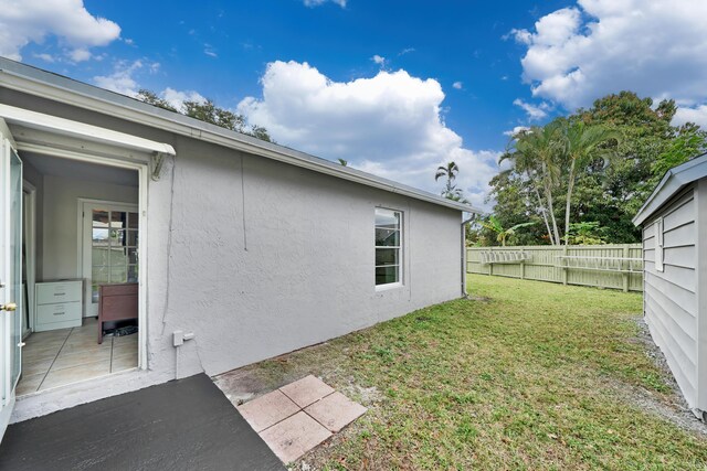 view of home's exterior with a patio area