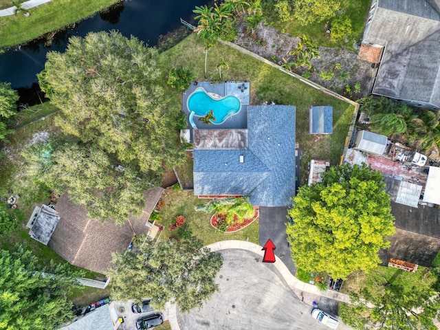 birds eye view of property featuring a water view