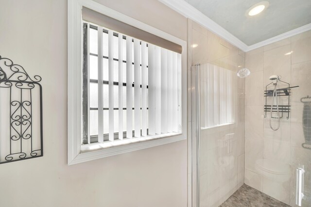 bathroom with tile patterned floors, ornamental molding, toilet, and vanity