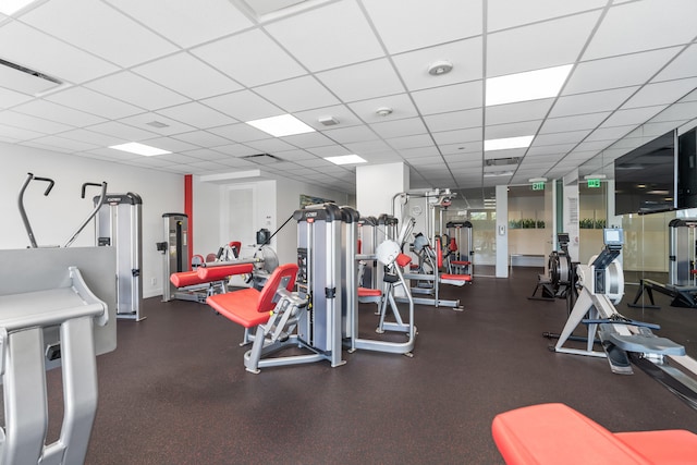 workout area with a drop ceiling