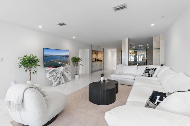 living room with light tile patterned floors