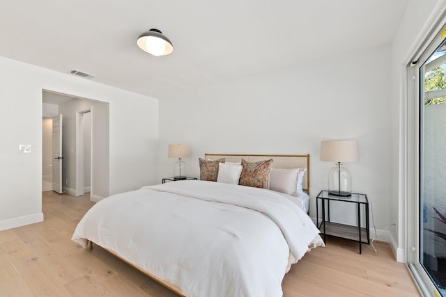 bedroom with light hardwood / wood-style floors