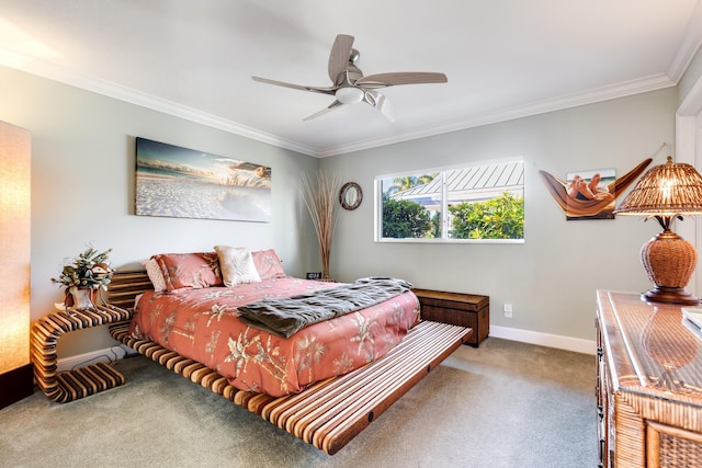 bedroom with ceiling fan, crown molding, and carpet