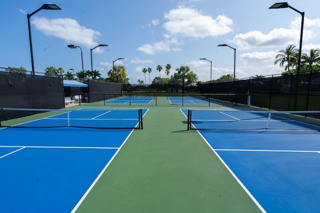 view of tennis court with basketball court