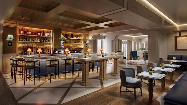 bar with beam ceiling, built in features, crown molding, and coffered ceiling