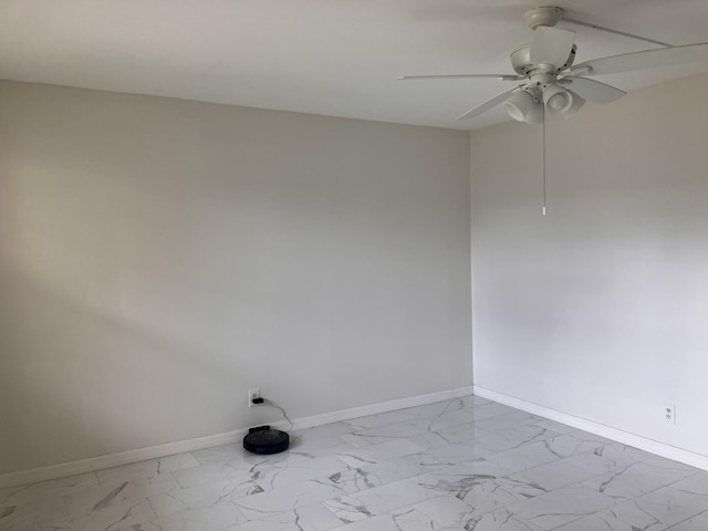 unfurnished room with ceiling fan