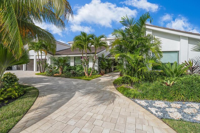 4561 Oak Tree Ct, Delray Beach, FL 33445 - community pool featuring a patio and outdoor lounge area