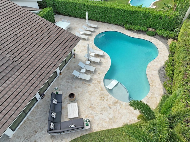 view of pool with a patio