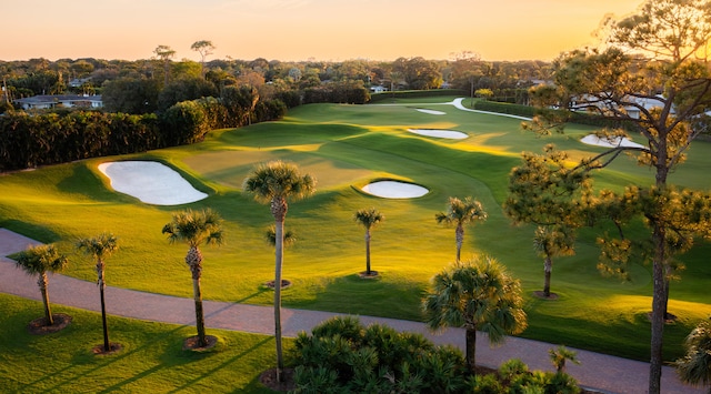 view of community featuring view of golf course