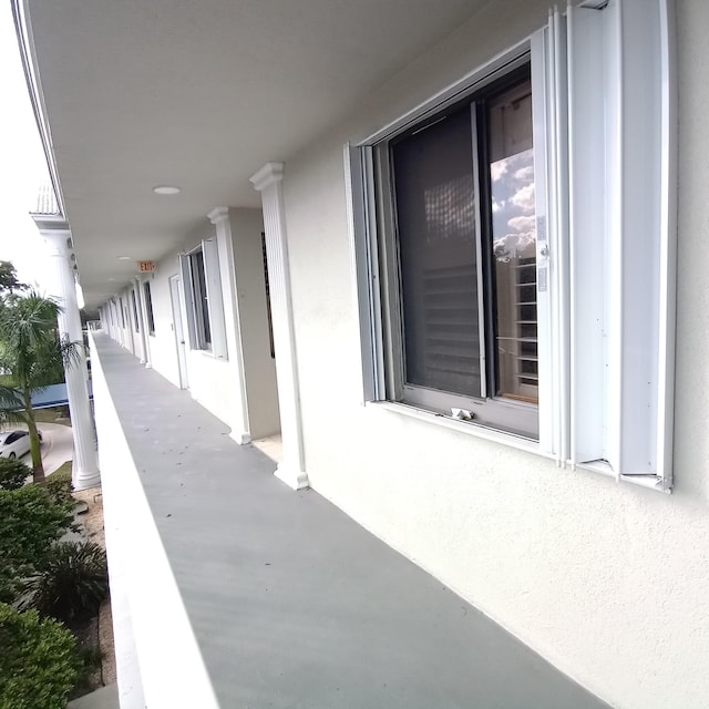 view of patio featuring a balcony