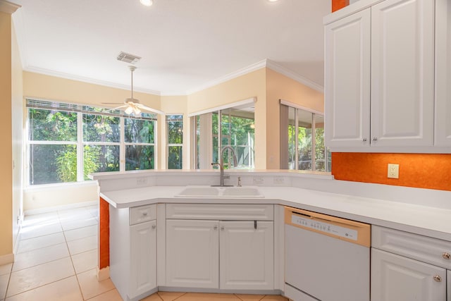 kitchen with white cabinetry, ceiling fan, sink, white dishwasher, and light tile patterned flooring