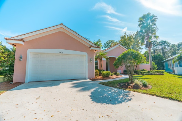 ranch-style house with a front yard and a garage