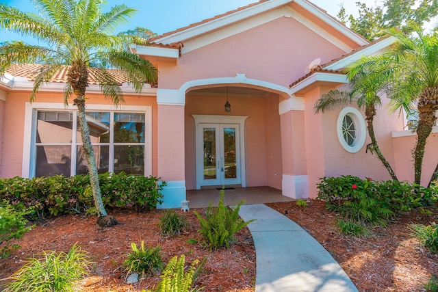 view of exterior entry with french doors