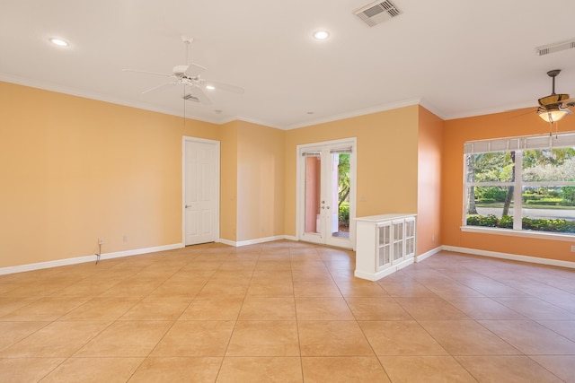 tiled spare room featuring plenty of natural light, ornamental molding, and ceiling fan