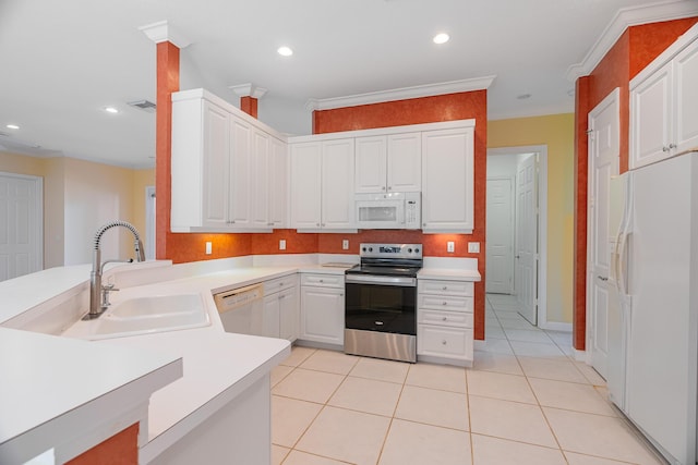 kitchen with white cabinetry, sink, kitchen peninsula, white appliances, and ornamental molding