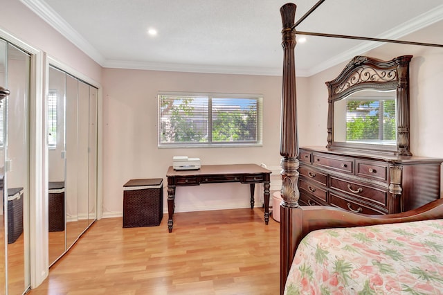 bedroom with light wood-type flooring, multiple windows, and crown molding